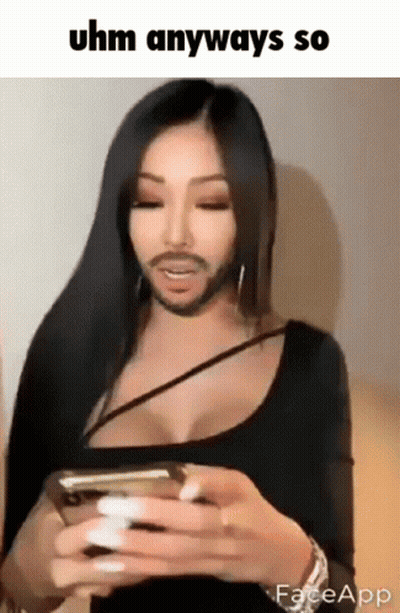 A Woman With A Fake Beard Is Holding A Cell Phone GIF