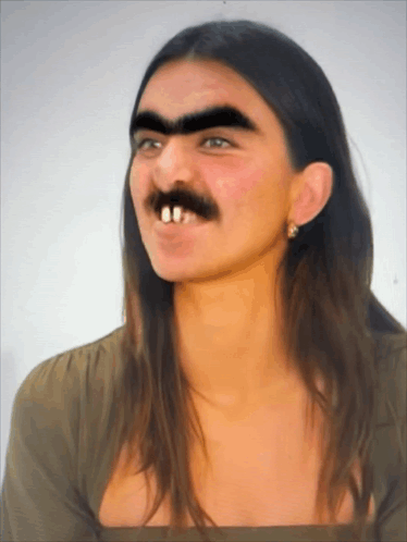 A Woman With A Fake Mustache And Teeth Is Smiling GIF