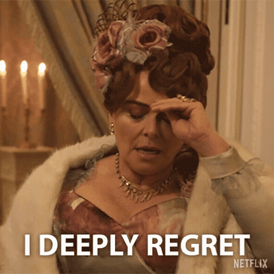 A Woman With A Flower In Her Hair Says I Deeply Regret GIF