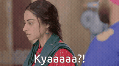 A Woman With A Green Scarf Around Her Neck Says Kyaaaa ? GIF