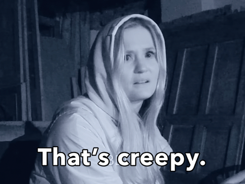 A Woman With A Hood On Her Head Says " That 'S Creepy " GIF