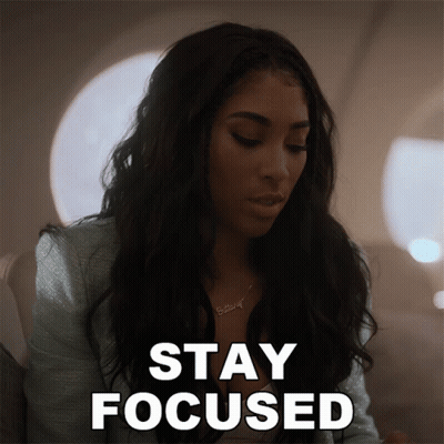 A Woman With A Name Tag That Says Brittany On It GIF
