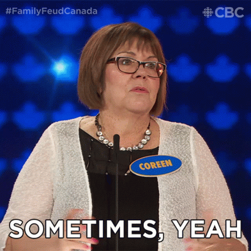 A Woman With A Name Tag That Says Coreen Stands In Front Of A Microphone And Says Sometimes Yeah GIF
