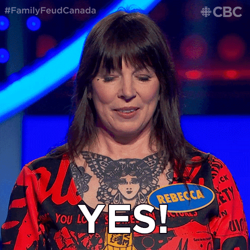 A Woman With A Name Tag That Says Rebecca GIF