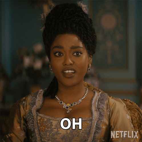 A Woman With A Necklace And Earrings Is Saying My Mistake GIF