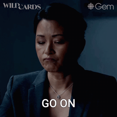 A Woman With A Necklace Says Go On GIF