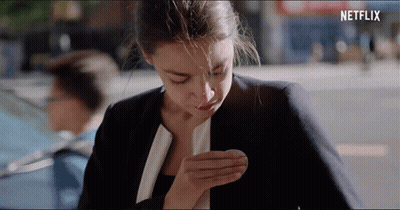 A Woman With A Netflix Logo On The Bottom GIF