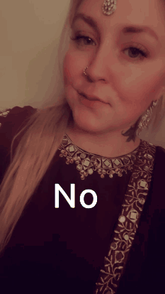 Woman With Nose Ring Wearing Maroon Dress Saying No GIF
