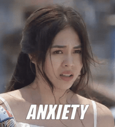 A Woman With A Ponytail And The Word Anxiety Written On Her Face GIF