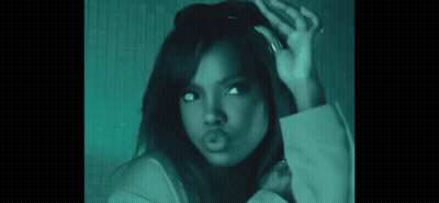 A Woman With A Ring On Her Finger Is Making A Face GIF