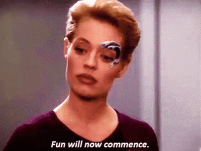 A Woman With A Robotic Eye Is Saying `` Fun Will Now Commence . '' GIF