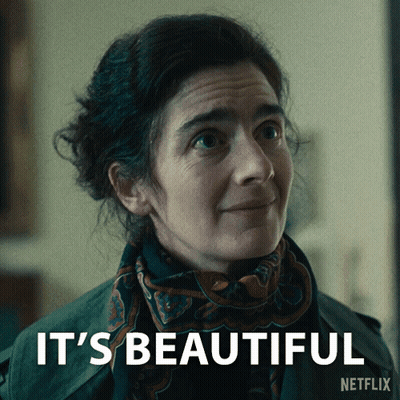 A Woman With A Scarf Around Her Neck Says It 'S Beautiful Netflix GIF