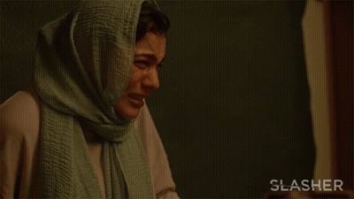 A Woman With A Scarf On Her Head Is Crying With The Words Leave Me Alone Behind Her GIF