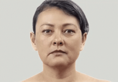 A Woman With A Serious Look On Her Face GIF