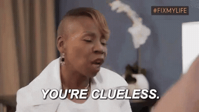 A Woman With A Shaved Head Is Talking To Another Woman And Saying `` You 'Re Clueless . '' GIF