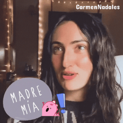 A Woman With A Sticker That Says Madre Mia On It GIF