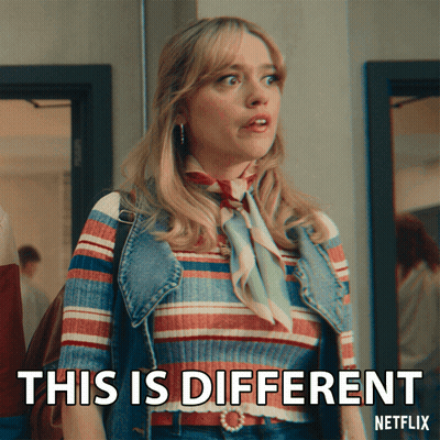 A Woman With A Striped Shirt And A Denim Vest Says This Is Different GIF