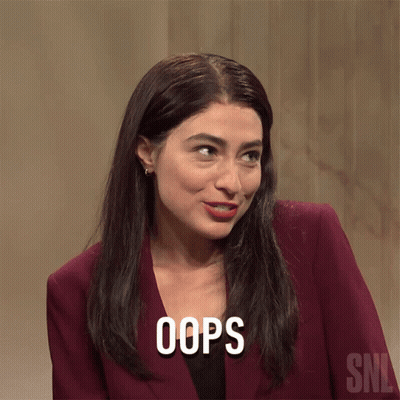 A Woman With A Surprised Look On Her Face And The Word Oops Above Her GIF