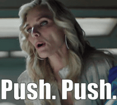 A Woman With A Surprised Look On Her Face And The Words Push Push Written Below Her GIF