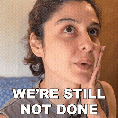 A Woman With A Surprised Look On Her Face And The Words We 'Re Still Not Done Behind Her GIF