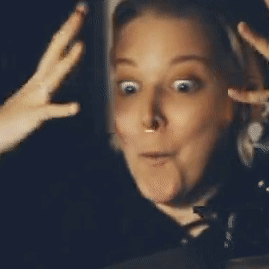 A Woman With A Surprised Look On Her Face And The Words Whaa- On Her Face GIF