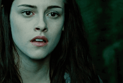 A Woman With A Surprised Look On Her Face GIF