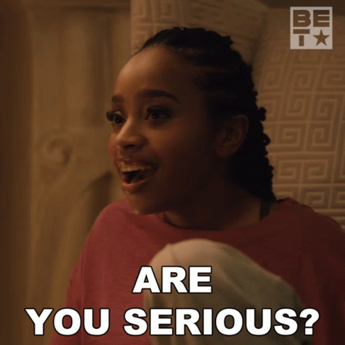 A Woman With A Surprised Look On Her Face Is Asking If She Is Serious GIF