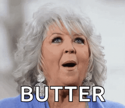 A Woman With A Surprised Look On Her Face Is Holding Her Mouth Open And Saying Butter . GIF