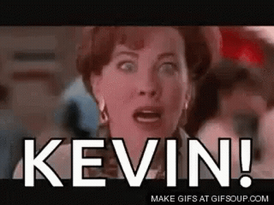 A Woman With A Surprised Look On Her Face Is Screaming The Word Kevin . GIF