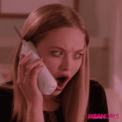 A Woman With A Surprised Look On Her Face Is Talking On A Phone With Meangirls Written On The Bottom Right GIF