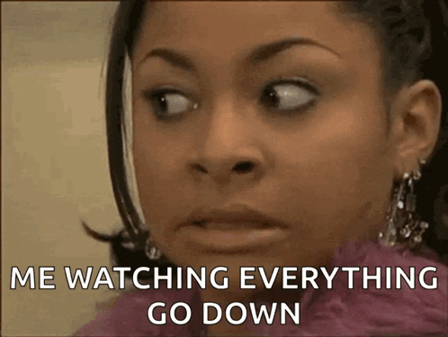 A Woman With A Surprised Look On Her Face Is Watching Everything Go Down GIF