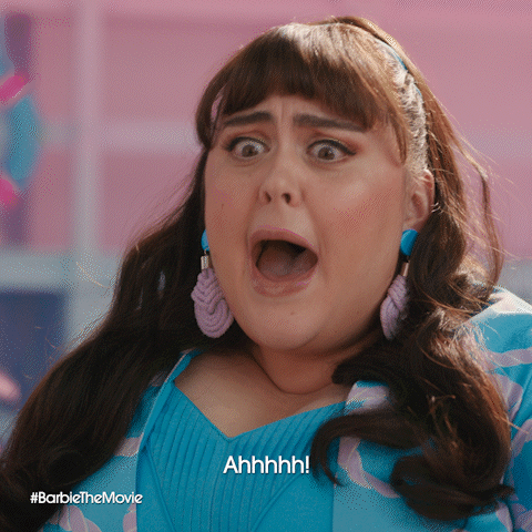 A Woman With A Surprised Look On Her Face Says Ahhhh On The Bottom GIF