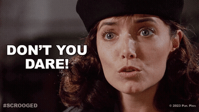 A Woman With A Surprised Look On Her Face Says " Don 'T You Dare " GIF