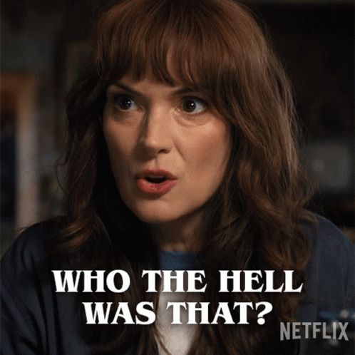 A Woman With A Surprised Look On Her Face Says " Who The Hell Was That Netflix " GIF
