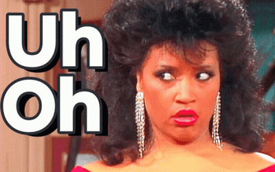 A Woman With A Surprised Look On Her Face With The Words Uh Oh Behind Her GIF