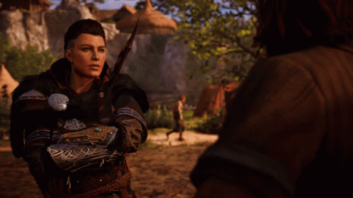 A Woman With A Sword Is Talking To Another Man GIF