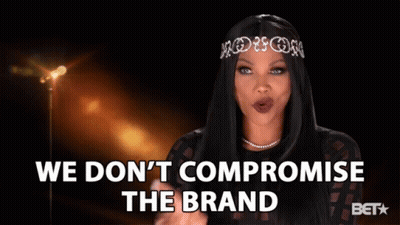 A Woman With A Tiara On Her Head Says We Don 'T Compromise The Brand GIF