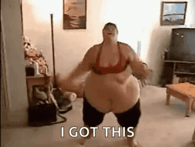 A Woman With A Very Large Belly Is Dancing In A Living Room And Says I Got This . GIF
