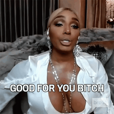 A Woman With A Very Large Breast Is Sitting On A Couch And Saying Good For You Bitch GIF