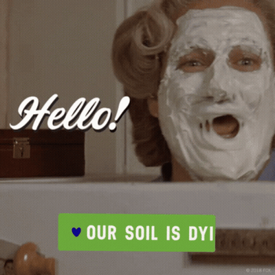 A Woman With A White Face Mask Says Hello Our Soil Is Dyi GIF