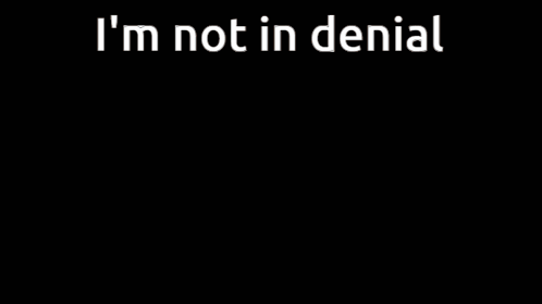 A Woman With An Angry Look On Her Face And The Words I 'M Not In Denial GIF