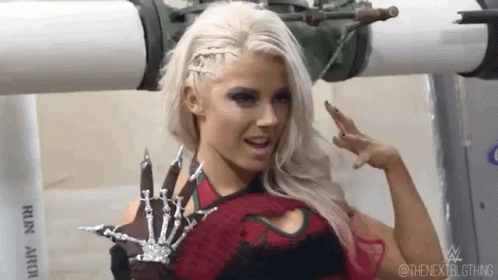 A Woman With Blonde Hair And A Skeleton Costume Is Standing Next To A Pipe . GIF
