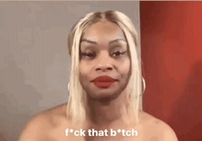 A Woman With Blonde Hair And Red Lips Is Making A Funny Face And Saying F * Ck That B * Tch . GIF