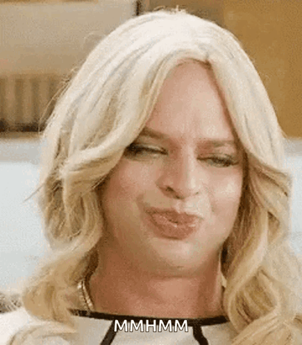 Woman With Blonde Hair Making Funny Face GIF
