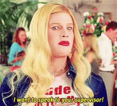 A Woman With Blonde Hair Is Wearing A T-Shirt That Says " I Want To Speak To Your Supervisor " GIF