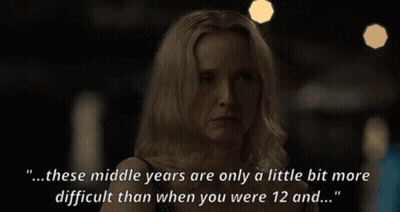 A Woman With Blonde Hair Says " These Middle Years Are Only A Little Bit More Difficult Than When You Were 12 And ... " GIF