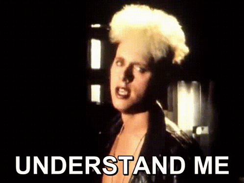 A Woman With Blonde Hair Stands In Front Of The Words Understand Me GIF