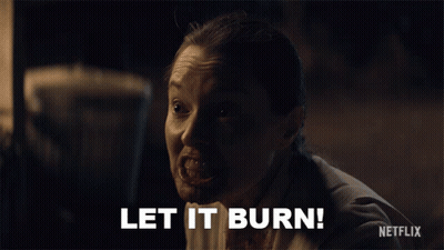 A Woman With Blood On Her Face Says Let It Burn In A Netflix Ad GIF