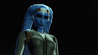 A Woman With Blue Hair And A Crown On Her Head Looks At The Camera GIF