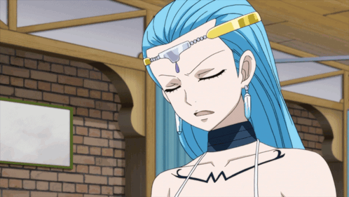 A Woman With Blue Hair Has A Necklace With The Letter M On Her Chest GIF